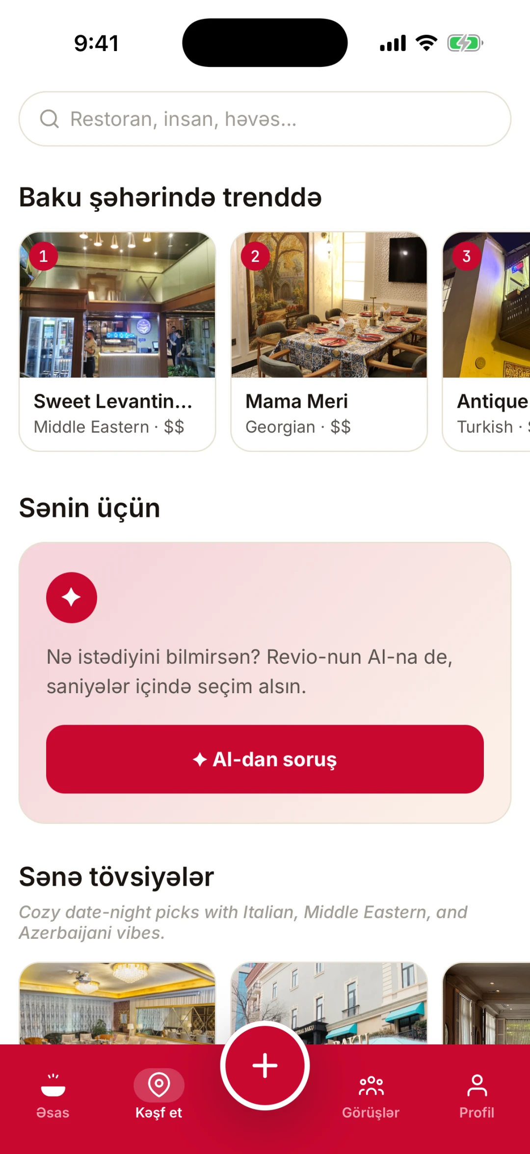 Revio Kəşf et ekranı: trenddə olan restoranlar, “AI-dan soruş” kartı və şəxsi tövsiyələr.